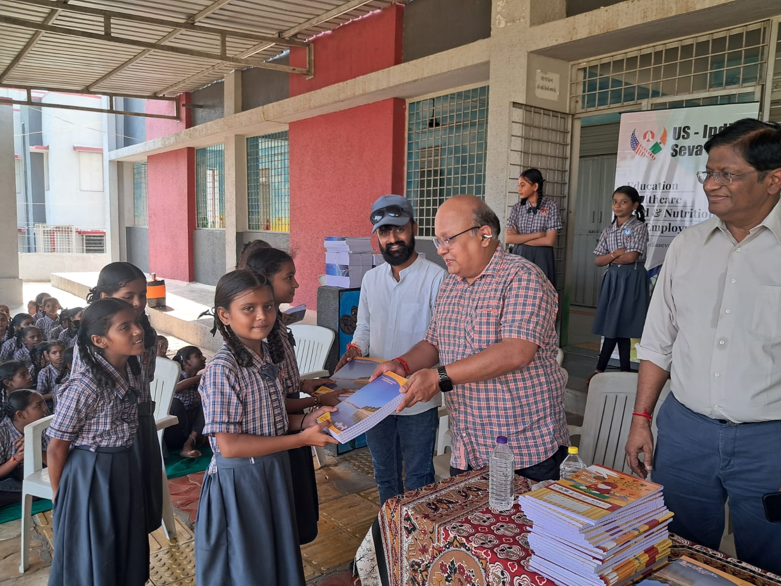 Notebook distribution at Bhadrva Kanya Shala